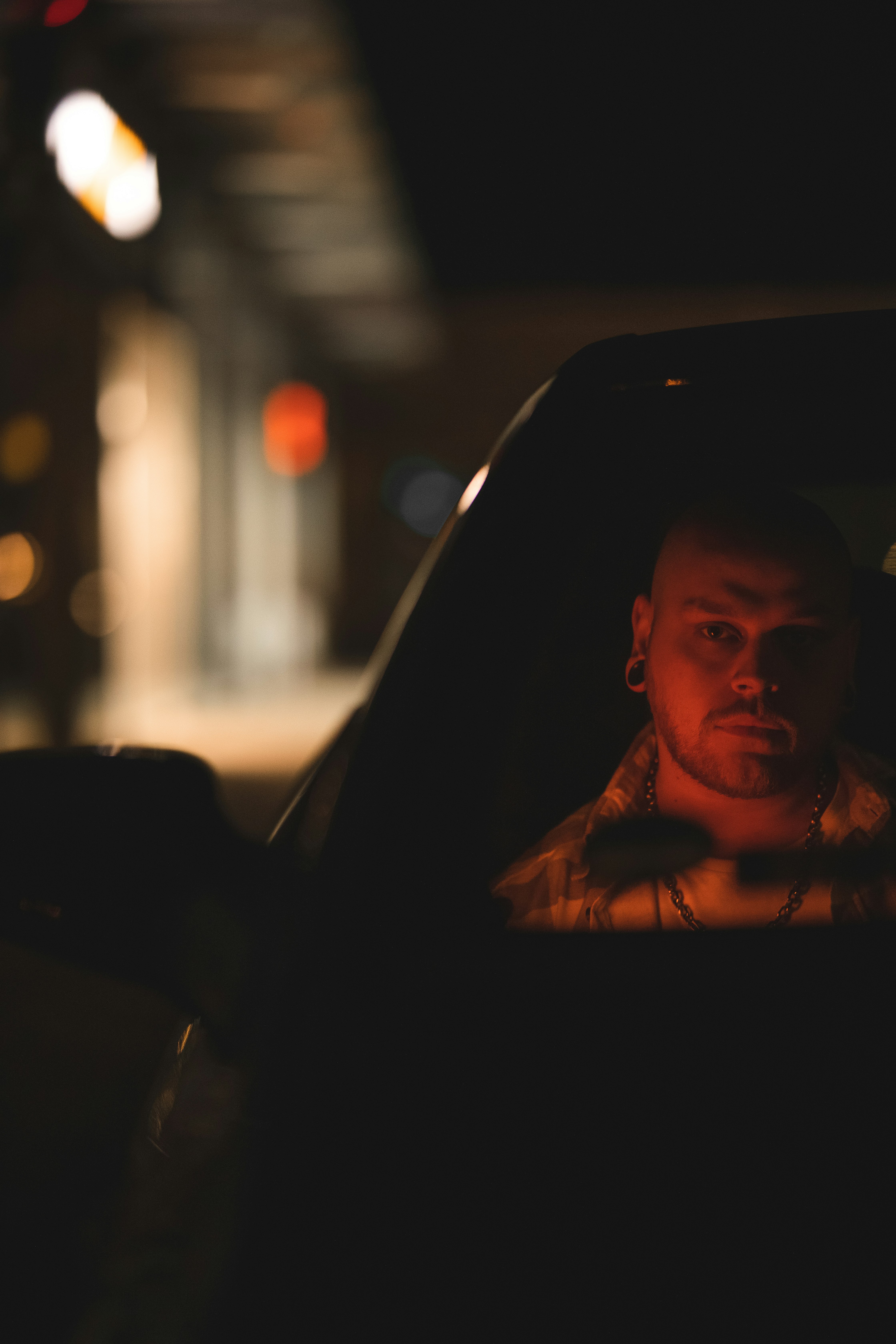 woman in black shirt sitting on car seat